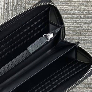 Tommy Hilfiger brand name embossed inside black leather long wallet