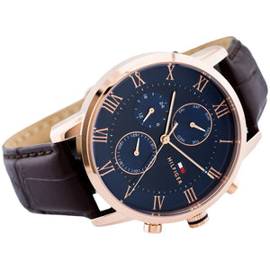 Angled shot highlighting the brown croc-embossed leather strap of Tommy Hilfiger 1791399
