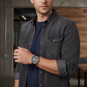 Man wearing elegant Tommy Hilfiger Keagan 1791289 watch with black leather strap