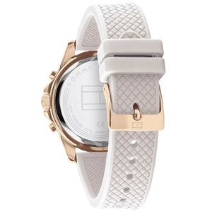 Woman wearing elegant sporty navy and gold Tommy Hilfiger Lori 1782199 watch