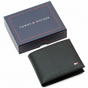 Authentic Tommy Hilfiger men's black Saffiano leather bifold wallet with enamel flag logo, presented in a premium navy branded gift box
