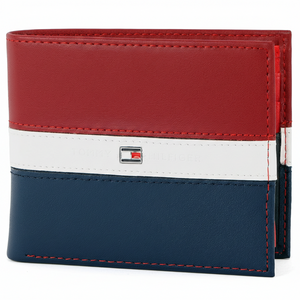 Front view of a Tommy Hilfiger men's leather wallet featuring a striking horizontal stripe pattern in red, white, and navy blue with a central enamel flag logo