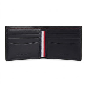 Live high-angle view of the Tommy Hilfiger leather wallet currency compartment displaying the navy fabric lining and original tracking barcode label