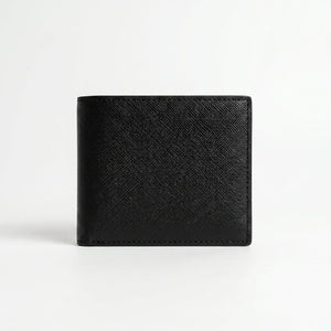 Live back view smartphone product photography of the Tommy Hilfiger smooth black leather wallet showing clean minimalist stitched edges