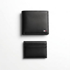 Live layout presentation of the Tommy Hilfiger saffiano textured black leather bifold wallet showcasing clean premium stitching detail