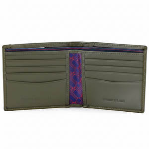 Interior view of a Tommy Hilfiger olive green leather bifold wallet displaying multiple card slots and premium branded signature lining