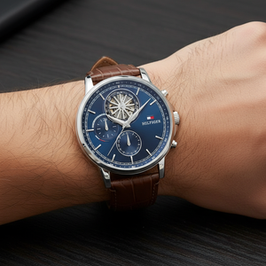 Close up of navy dial and skeleton window showing inner movement of Tommy Hilfiger 1710629