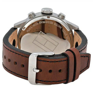 Angled shot highlighting the brown perforated leather strap on Tommy Hilfiger 1791049