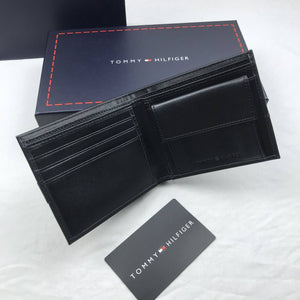 Black leather wallet and cardholder with Tommy Hilfiger branding on a white background
