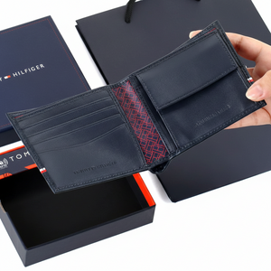 Interior view of Tommy Hilfiger Navy Wallet showing coin pocket and branded details