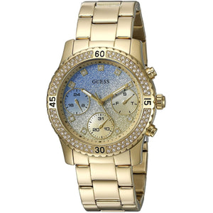 Angled real-life photo of Guess W0774L2 showing the gold case and metal strap