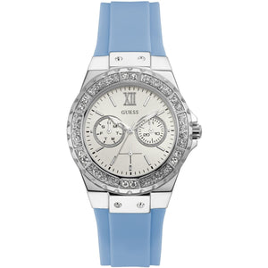 Guess Limelight W1053L5 women's watch featuring a silver-tone case with crystal bezel, white multi-function dial, and sky blue rubber strap