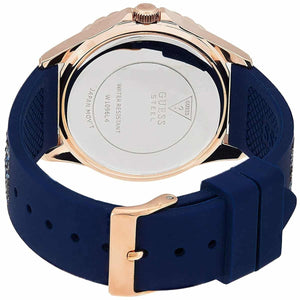 Caseback of Guess Swirl W1096L4 women's quartz battery watch showing technical specs 30m water resistance and stainless steel material