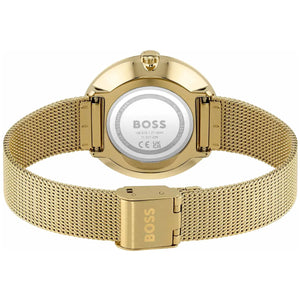 Perspective view of the radiant crystal dial and gold hands of Hugo Boss watch
