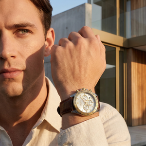 Professional leader wearing Hugo Boss Ikon 1513174 with silver dial and brown leather strap water resistant 100m