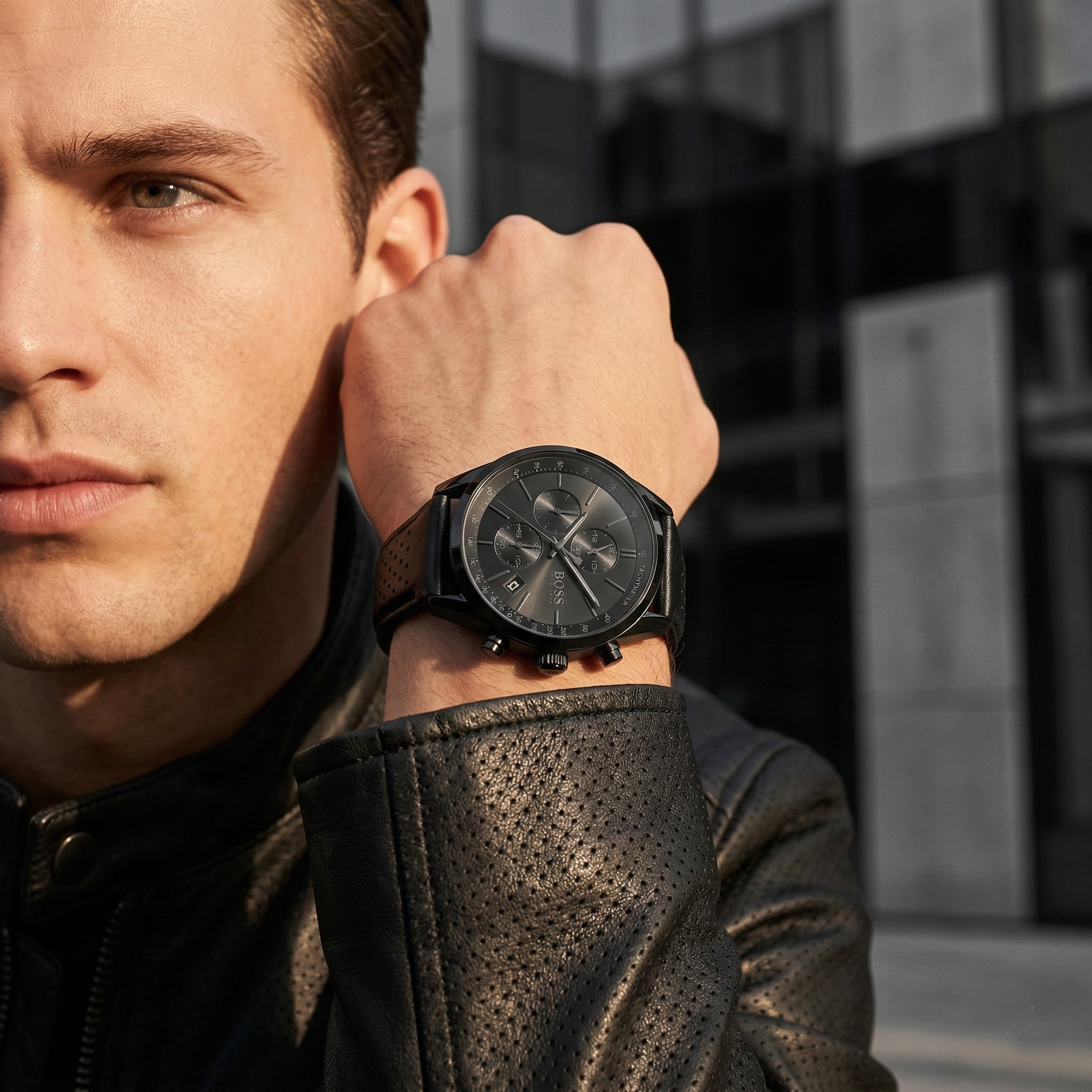 Professional man wearing Hugo Boss Grand Prix 1513474 with black dial and black leather strap water resistant 50m