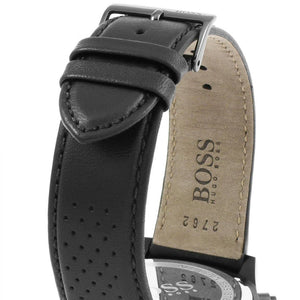 Close-up of a black leather watch strap with 'BOSS' branding on a white background