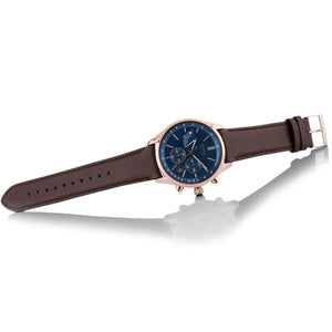 Live photo of Hugo Boss Grand Prix 1513604 showing actual blue sunray dial and brown perforated leather strap colors