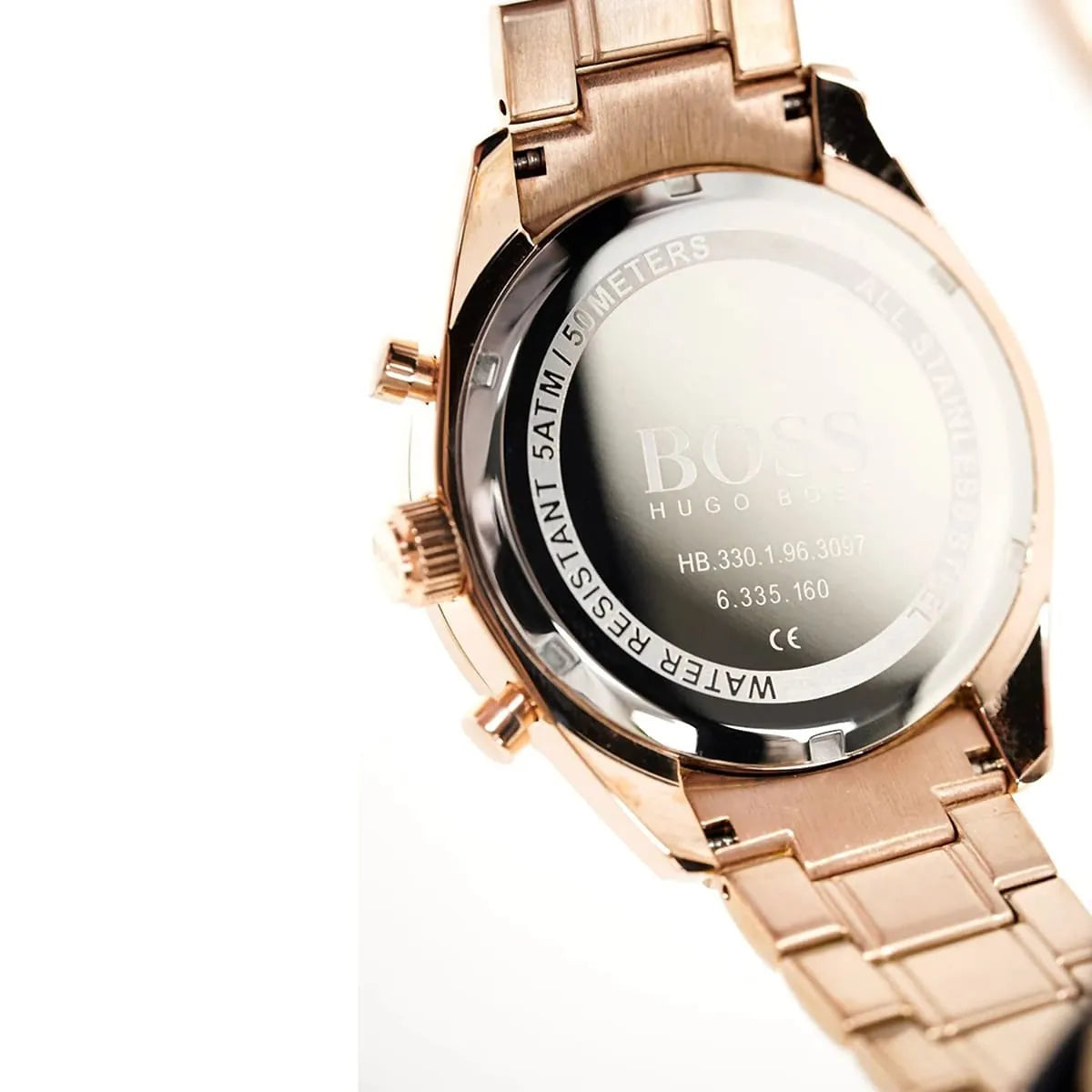 Caseback of Hugo Boss Trophy 1513632 showing technical specs gray dial and rose gold metal strap 50m water resistance