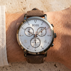 Close up of Hugo Boss Spirit 1513690 on wrist showing silver dial and brown textile strap with 30m water resistance
