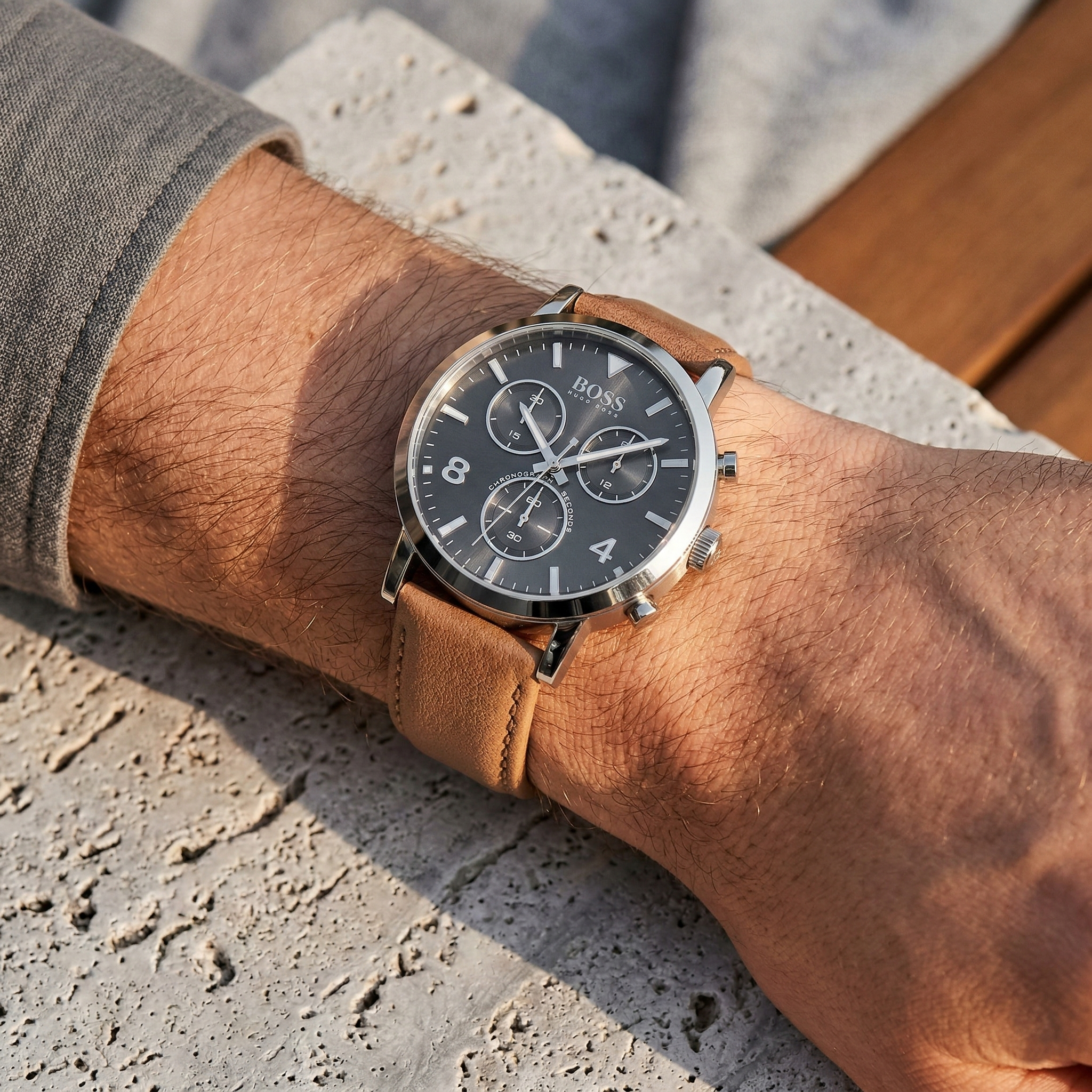 Close up of Hugo Boss Spirit 1513691 on wrist showing gray dial and brown leather strap with 30m water resistance