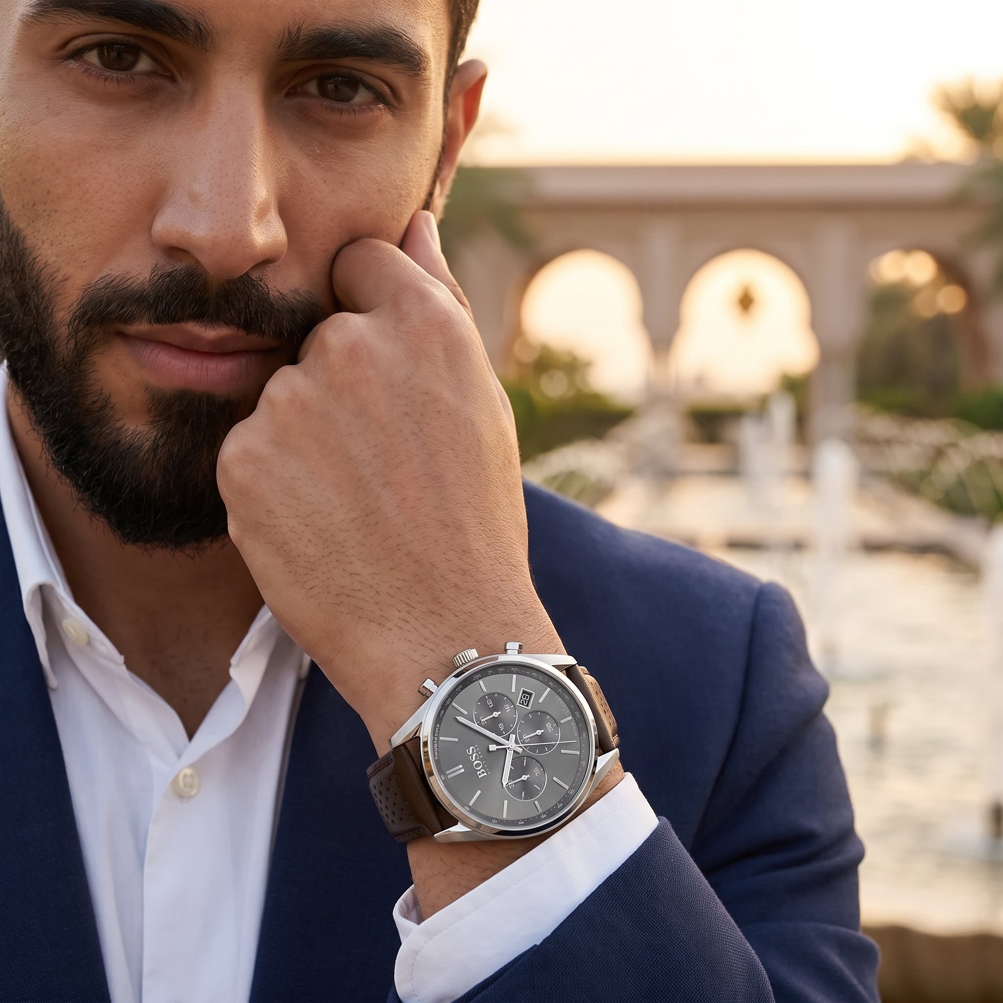 Lifestyle luxury shot featuring Hugo Boss Champion 1513815 men's watch.