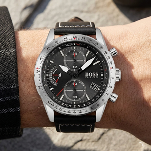 Close up of Hugo Boss Pilot Edition 1513853 on wrist showing black dial and leather strap with white stitching 50m water resistance