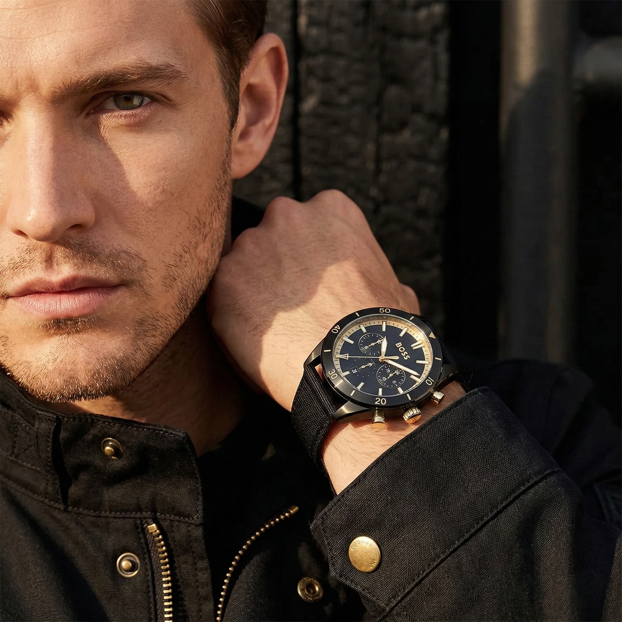 Professional man wearing Hugo Boss Santiago 1513935 with black dial and black case fiber strap water resistant 50m