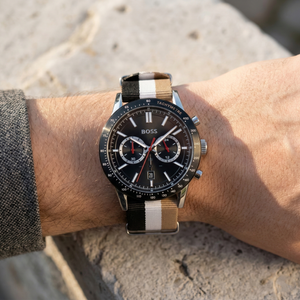 Close up of Hugo Boss Allure 1513963 on wrist showing black dial and multicolored fiber strap with 50m water resistance