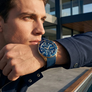 Professional leader wearing Hugo Boss Admiral 1513965 with blue dial and blue rubber strap water resistant 100m