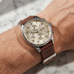 Close up of Hugo Boss View 1513990 on wrist showing beige dial and brown leather strap with 50m water resistance
