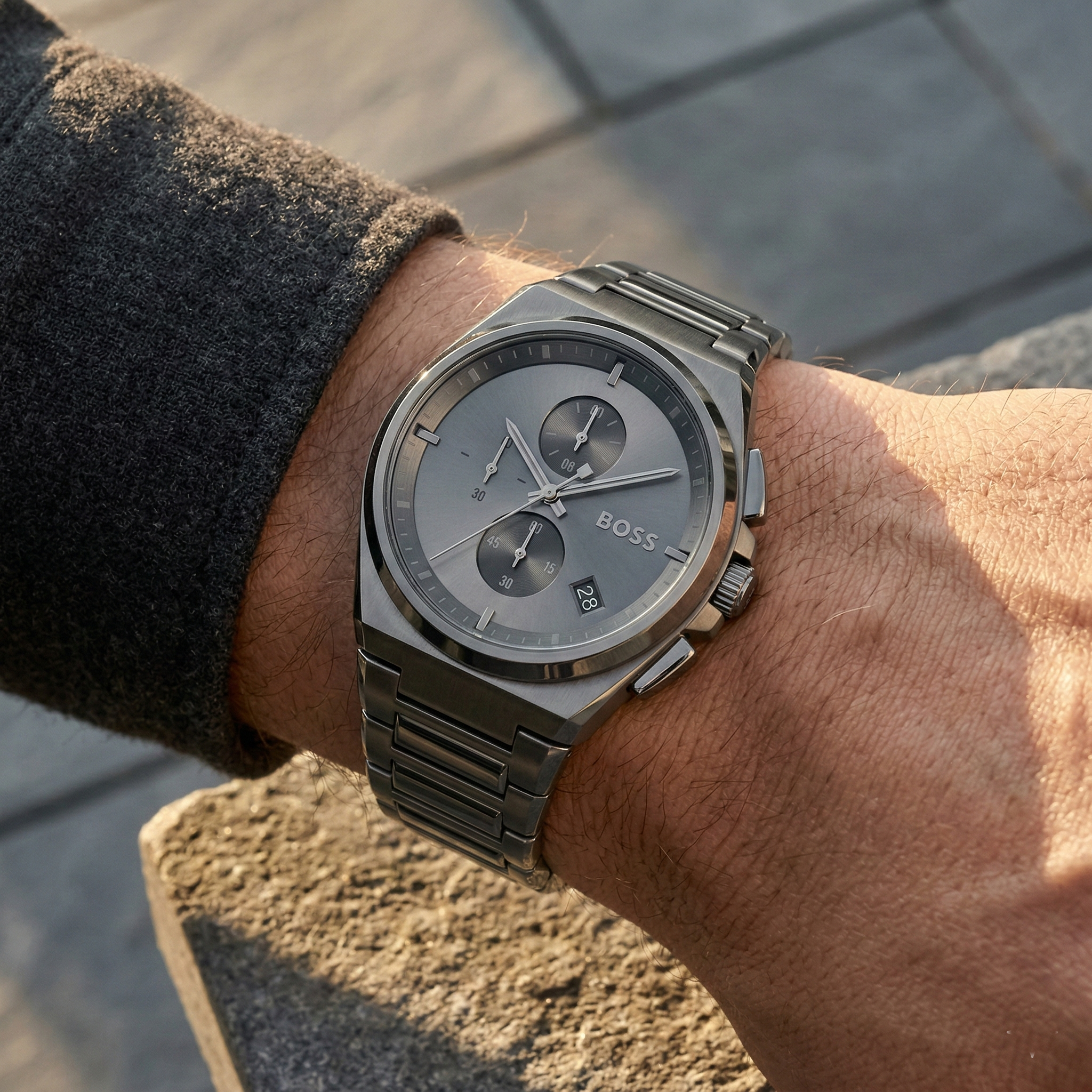 Close up of Hugo Boss Steer 1513996 on wrist showing gray dial and gray monochromatic case with 50m water resistance