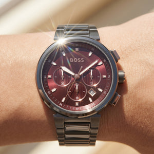 Close up shot of Boss One 1514000 on wrist showing the sleek gunmetal case and textured red dial from Luxury Hub Store