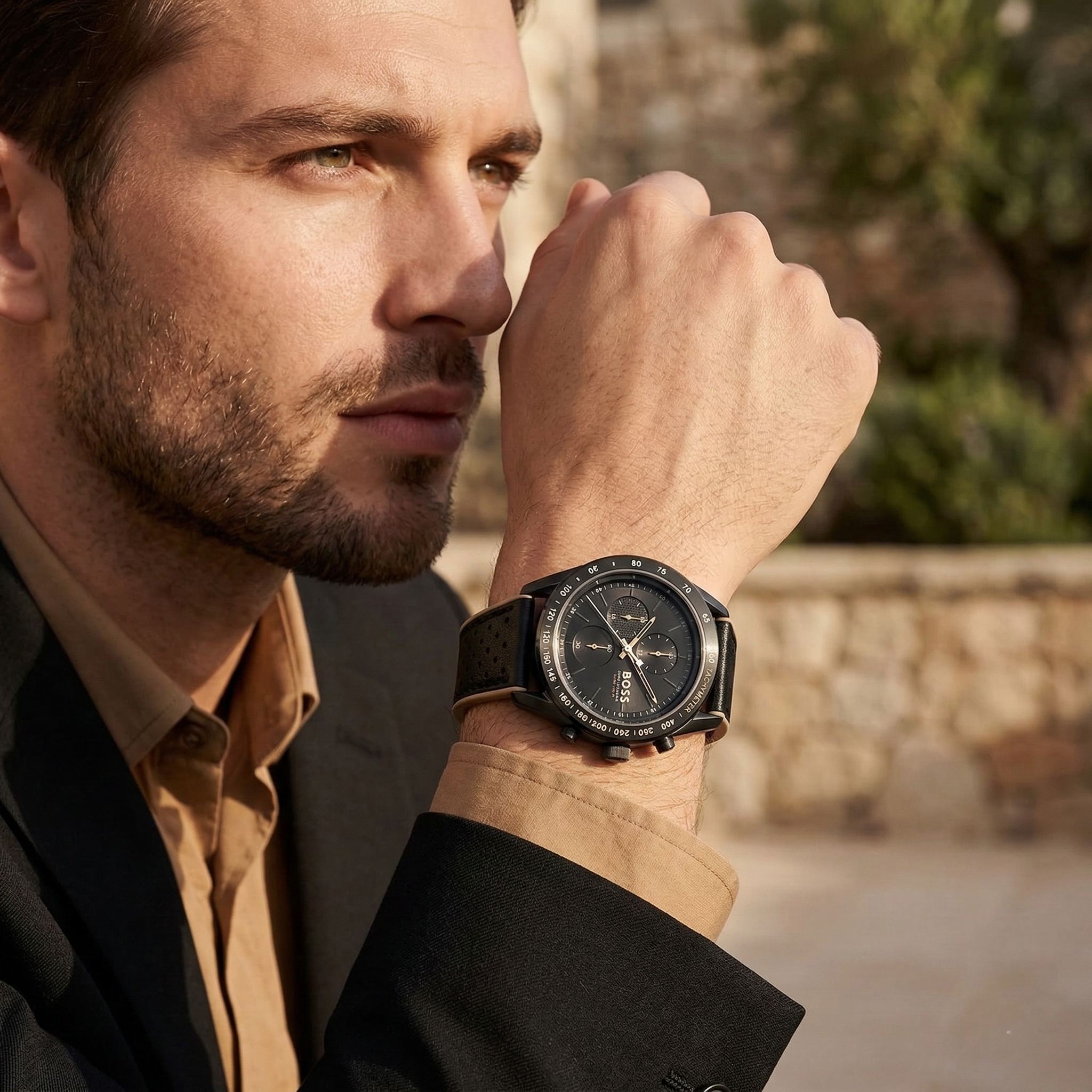 Professional man wearing Hugo Boss Centre Court 1514022 with black dial and gunmetal case rubber strap water resistant 100m
