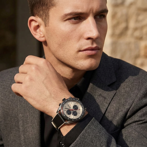 Professional man wearing Hugo Boss Centre Court 1514024 with champagne dial and gunmetal case leather strap water resistant 100m