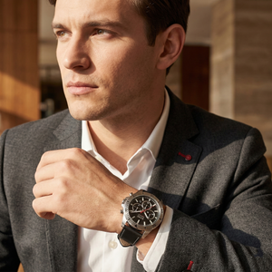Professional man wearing Hugo Boss Troper 1514055 with black dial and silver case leather strap water resistant 50m