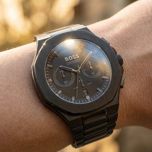 Close up shot of Boss Taper 1514088 on wrist showing the sleek black dial and modern case shape from Luxury Hub Store