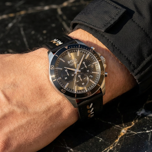 Close up of Hugo Boss Troper 1514121 on wrist showing black sunray dial and black leather strap with 50m water resistance