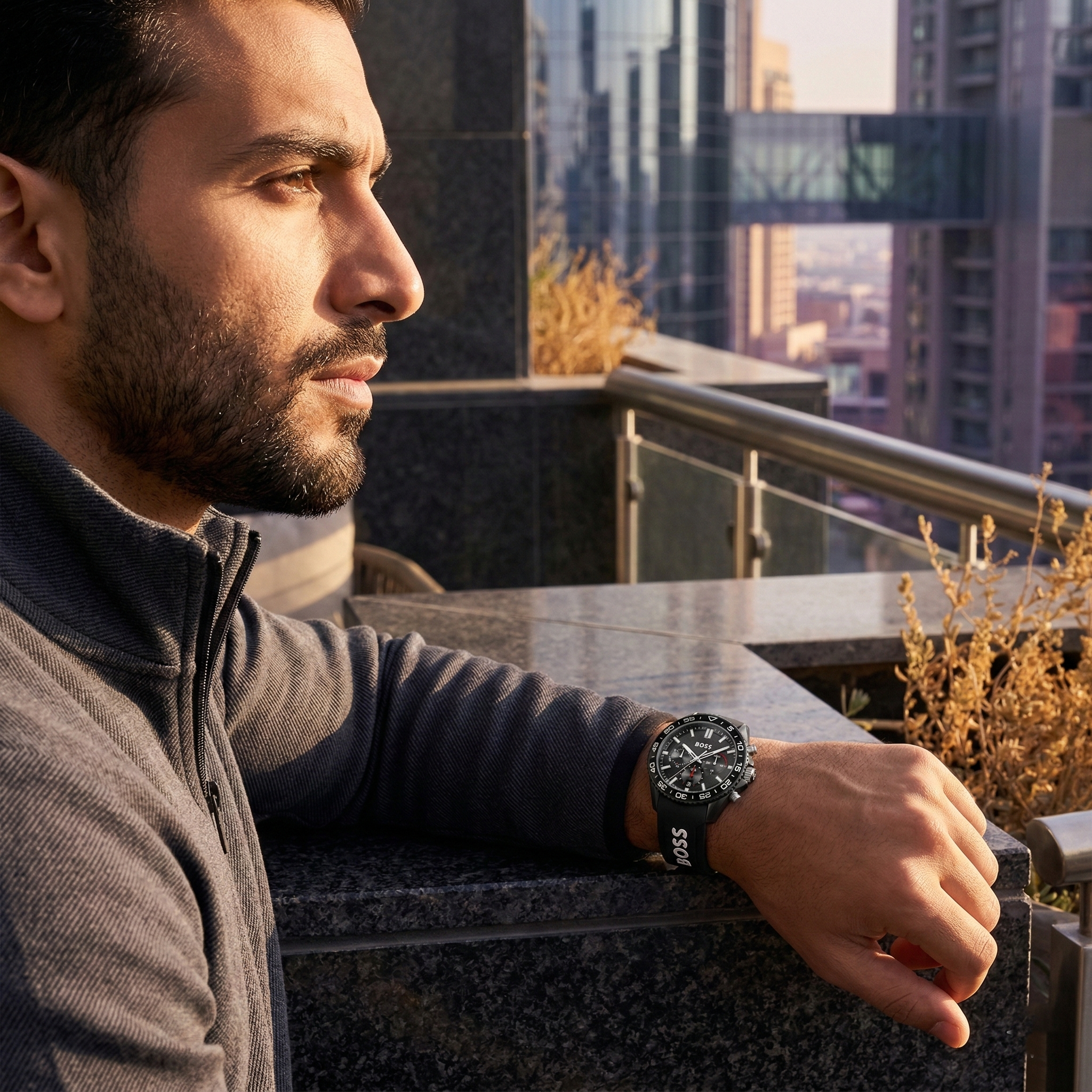 Sporty man wearing Hugo Boss Runner 1514141 with black dial and black rubber strap water resistant 50m