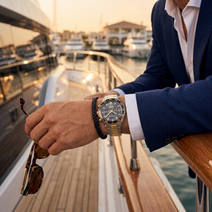 Lifestyle photo of Boss Runner 1514144 showing the bold two-tone watch on a man's wrist in a professional setting