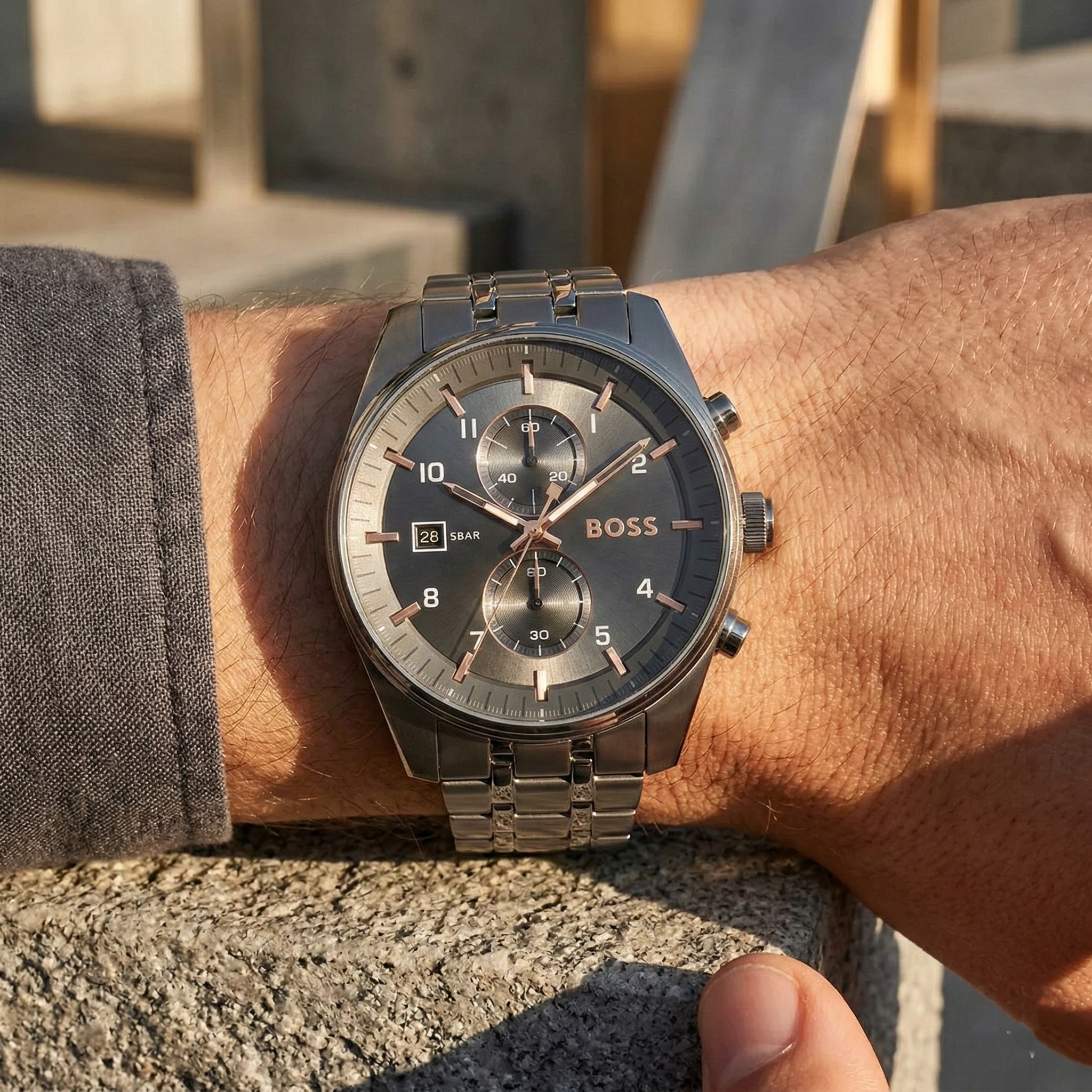 Close up of Hugo Boss Sky Traveller 1514153 on wrist showing gray dial and gray monochromatic case with 50m water resistance