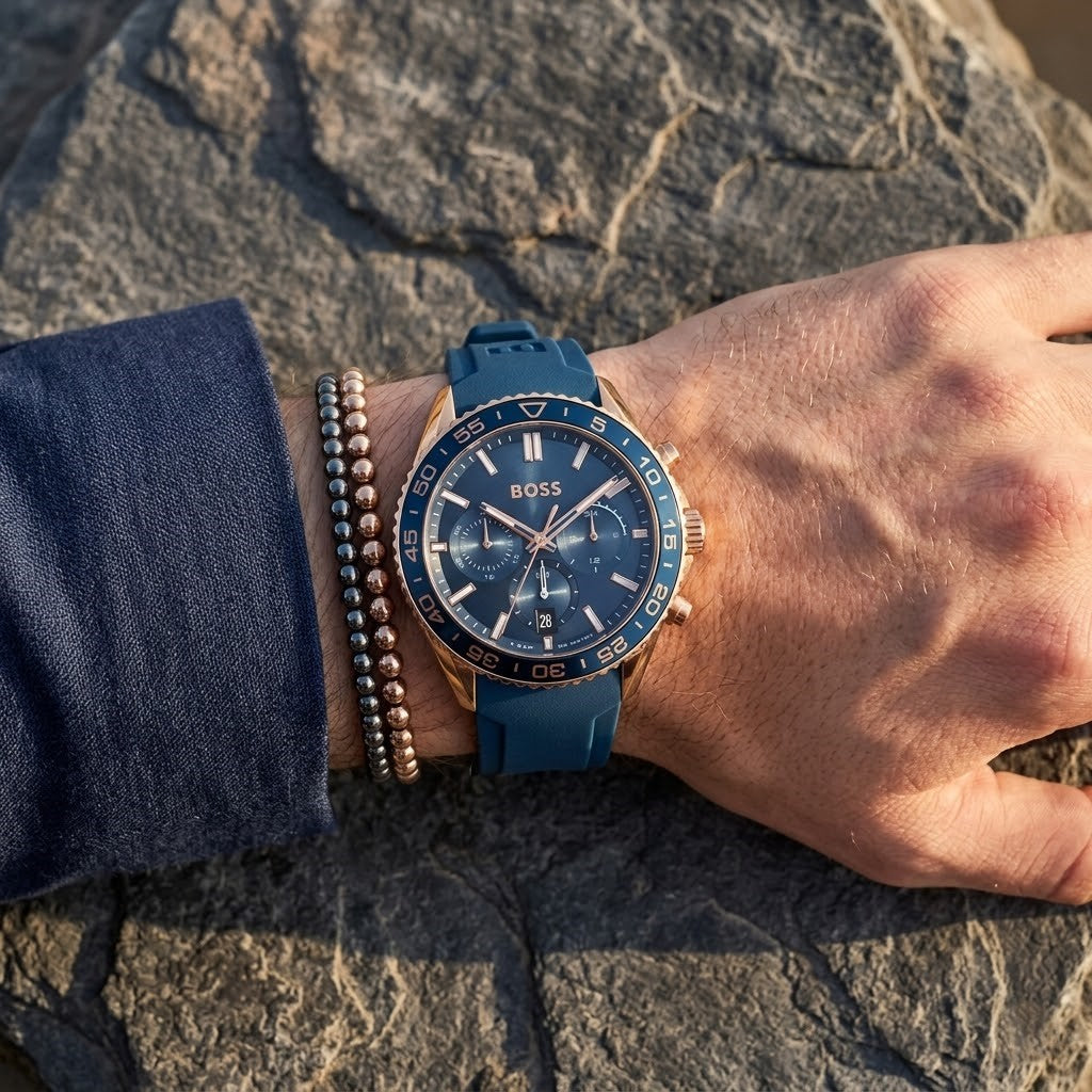 Close up shot of Hugo Boss 1514169 on wrist showing blue bezel and rose gold-tone case