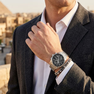 Lifestyle photo of Hugo Boss 1514251 showing the bold silver watch on a man's wrist