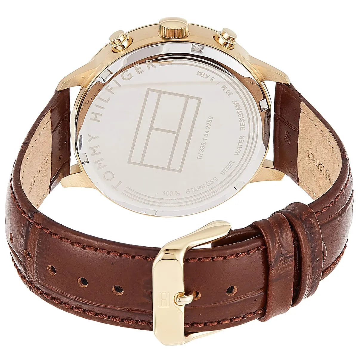 Caseback of Tommy Hilfiger Liam 1710359 men's quartz battery watch showing technical specs blue dial and leather strap