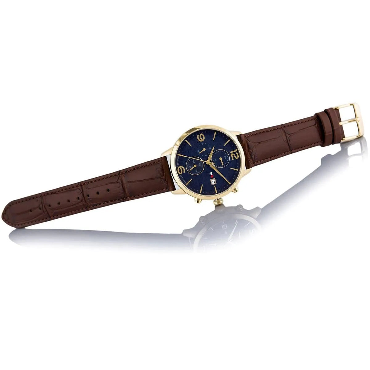Live photo of Tommy Hilfiger Liam 1710359 men's quartz battery watch showing actual gold finish and deep blue sunray dial