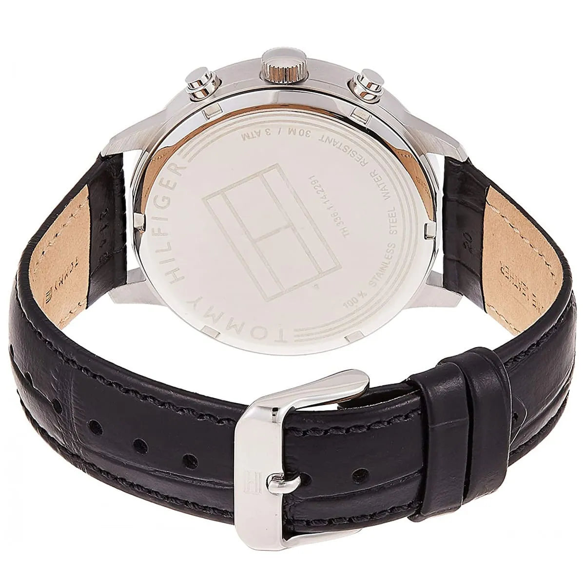 Caseback of Tommy Hilfiger Liam 1710361 men's quartz battery watch showing technical specs gray dial and leather strap