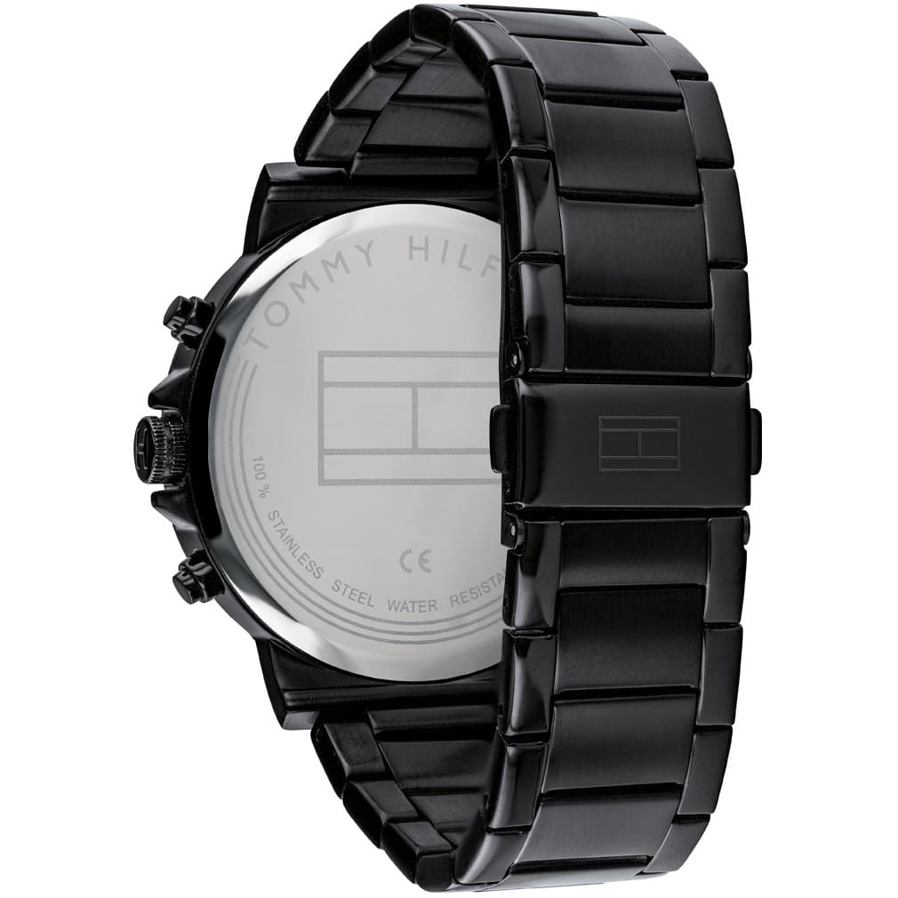 Caseback of Tommy Hilfiger Daniel 1710383 men's quartz battery watch showing technical specs black dial and metal bracelet