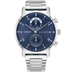 Tommy Hilfiger watch with blue dial and silver metal strap on a white background