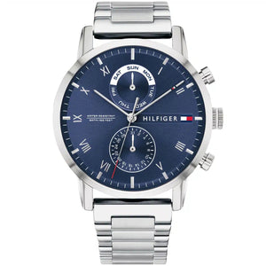 Tommy Hilfiger watch with blue dial and silver metal strap on a white background