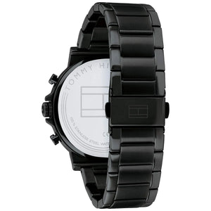 Caseback of Tommy Hilfiger Daniel 1710414 men's quartz battery watch showing technical specs black dial and metal bracelet